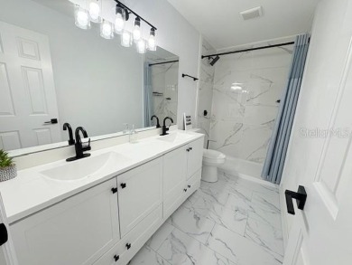 COME AND SEE THIS GORGEOUS REMODELED HOME!  THIS IS LIKE A NEW on Eagle Ridge At Spruce Creek Country Club in Florida - for sale on GolfHomes.com, golf home, golf lot
