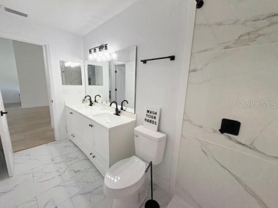 COME AND SEE THIS GORGEOUS REMODELED HOME!  THIS IS LIKE A NEW on Eagle Ridge At Spruce Creek Country Club in Florida - for sale on GolfHomes.com, golf home, golf lot