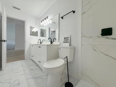 COME AND SEE THIS GORGEOUS REMODELED HOME!  THIS IS LIKE A NEW on Eagle Ridge At Spruce Creek Country Club in Florida - for sale on GolfHomes.com, golf home, golf lot