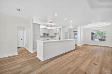 This completely remodeled 3-bedroom, 2-bath home is a rare find on Tanglewood Golf Club in Florida - for sale on GolfHomes.com, golf home, golf lot