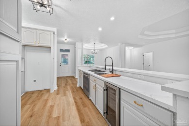 This completely remodeled 3-bedroom, 2-bath home is a rare find on Tanglewood Golf Club in Florida - for sale on GolfHomes.com, golf home, golf lot