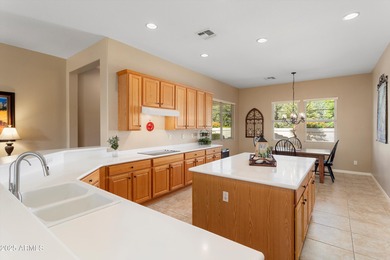 This favored Encanto model is located within walking distance of on Corte Bella Golf Club in Arizona - for sale on GolfHomes.com, golf home, golf lot