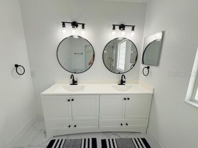 COME AND SEE THIS GORGEOUS REMODELED HOME!  THIS IS LIKE A NEW on Eagle Ridge At Spruce Creek Country Club in Florida - for sale on GolfHomes.com, golf home, golf lot
