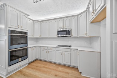 This completely remodeled 3-bedroom, 2-bath home is a rare find on Tanglewood Golf Club in Florida - for sale on GolfHomes.com, golf home, golf lot