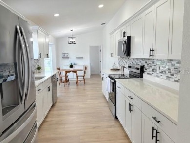 COME AND SEE THIS GORGEOUS REMODELED HOME!  THIS IS LIKE A NEW on Eagle Ridge At Spruce Creek Country Club in Florida - for sale on GolfHomes.com, golf home, golf lot