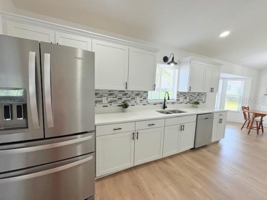 COME AND SEE THIS GORGEOUS REMODELED HOME!  THIS IS LIKE A NEW on Eagle Ridge At Spruce Creek Country Club in Florida - for sale on GolfHomes.com, golf home, golf lot