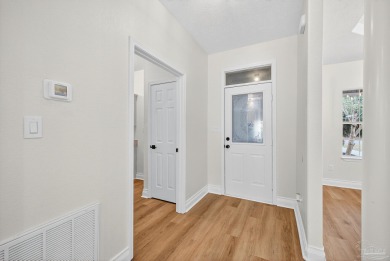 This completely remodeled 3-bedroom, 2-bath home is a rare find on Tanglewood Golf Club in Florida - for sale on GolfHomes.com, golf home, golf lot