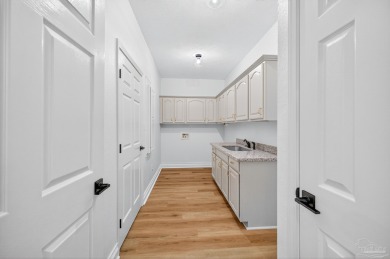 This completely remodeled 3-bedroom, 2-bath home is a rare find on Tanglewood Golf Club in Florida - for sale on GolfHomes.com, golf home, golf lot