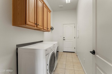 This favored Encanto model is located within walking distance of on Corte Bella Golf Club in Arizona - for sale on GolfHomes.com, golf home, golf lot