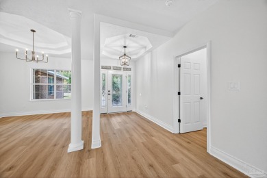 This completely remodeled 3-bedroom, 2-bath home is a rare find on Tanglewood Golf Club in Florida - for sale on GolfHomes.com, golf home, golf lot