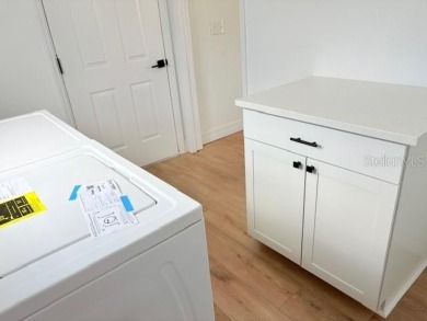 COME AND SEE THIS GORGEOUS REMODELED HOME!  THIS IS LIKE A NEW on Eagle Ridge At Spruce Creek Country Club in Florida - for sale on GolfHomes.com, golf home, golf lot