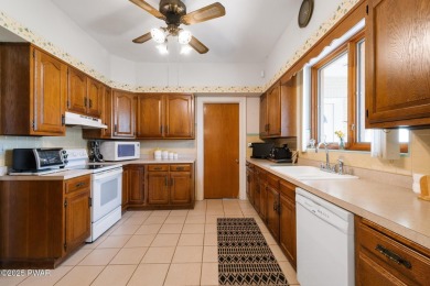 Available for the first time in over 55 years, this iconic on Elkview Country Club in Pennsylvania - for sale on GolfHomes.com, golf home, golf lot