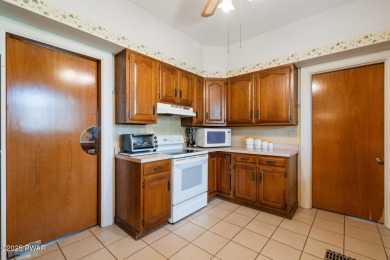 Available for the first time in over 55 years, this iconic on Elkview Country Club in Pennsylvania - for sale on GolfHomes.com, golf home, golf lot