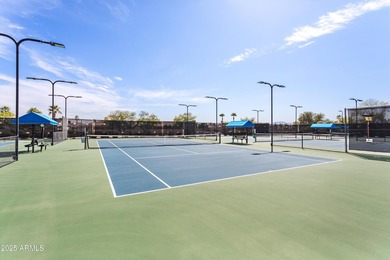 This favored Encanto model is located within walking distance of on Corte Bella Golf Club in Arizona - for sale on GolfHomes.com, golf home, golf lot