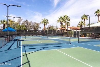 This favored Encanto model is located within walking distance of on Corte Bella Golf Club in Arizona - for sale on GolfHomes.com, golf home, golf lot