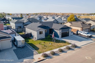 55 Wolf Creek Ln in Gillette WY is situated next to a stunning on Gillette Golf Club in Wyoming - for sale on GolfHomes.com, golf home, golf lot