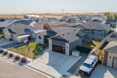 55 Wolf Creek Ln in Gillette WY is situated next to a stunning on Gillette Golf Club in Wyoming - for sale on GolfHomes.com, golf home, golf lot