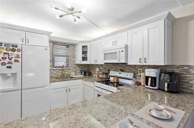 Welcome to this stunning 2-bed 2-bath condo located on the first on Boca Dunes Golf and Country Club in Florida - for sale on GolfHomes.com, golf home, golf lot
