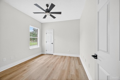 This completely remodeled 3-bedroom, 2-bath home is a rare find on Tanglewood Golf Club in Florida - for sale on GolfHomes.com, golf home, golf lot