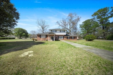 Welcome to this charming split-level brick ranch in the highly on Berkeley Country Club in South Carolina - for sale on GolfHomes.com, golf home, golf lot