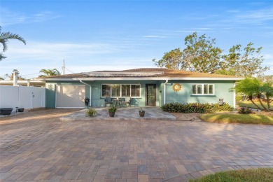 Welcome to an impeccable, move-in-ready corner lot Ranch home in on St. Petersburg Country Club in Florida - for sale on GolfHomes.com, golf home, golf lot