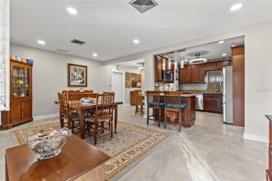 Welcome to an impeccable, move-in-ready corner lot Ranch home in on St. Petersburg Country Club in Florida - for sale on GolfHomes.com, golf home, golf lot