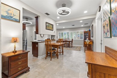 Welcome to an impeccable, move-in-ready corner lot Ranch home in on St. Petersburg Country Club in Florida - for sale on GolfHomes.com, golf home, golf lot