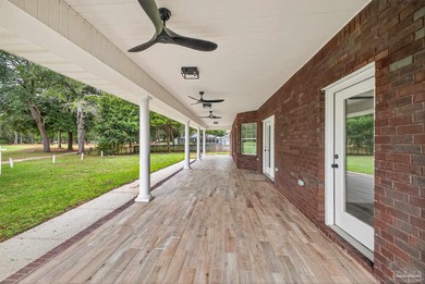 This completely remodeled 3-bedroom, 2-bath home is a rare find on Tanglewood Golf Club in Florida - for sale on GolfHomes.com, golf home, golf lot