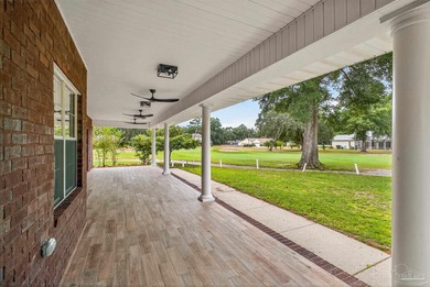 This completely remodeled 3-bedroom, 2-bath home is a rare find on Tanglewood Golf Club in Florida - for sale on GolfHomes.com, golf home, golf lot
