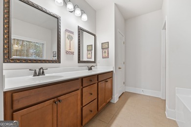 This charming 3-bedroom, 2-bath home is nestled in the sought on Canongate At Heron Bay in Georgia - for sale on GolfHomes.com, golf home, golf lot