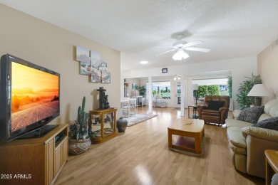 Stop By And View This Expanded Coconino Model Home On Hole on Sun City Lakes West and East in Arizona - for sale on GolfHomes.com, golf home, golf lot