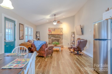 Charming and beautifully updated home nestled at the base of on Springdale Golf - Country Club in North Carolina - for sale on GolfHomes.com, golf home, golf lot