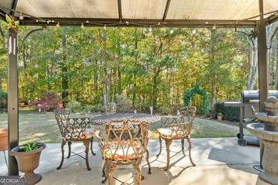This charming 3-bedroom, 2-bath home is nestled in the sought on Canongate At Heron Bay in Georgia - for sale on GolfHomes.com, golf home, golf lot