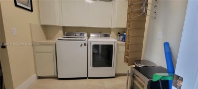 Welcome to this updated spacious condo located on the top floor on Pine Island Ridge Country Club in Florida - for sale on GolfHomes.com, golf home, golf lot