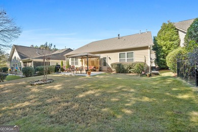 This charming 3-bedroom, 2-bath home is nestled in the sought on Canongate At Heron Bay in Georgia - for sale on GolfHomes.com, golf home, golf lot