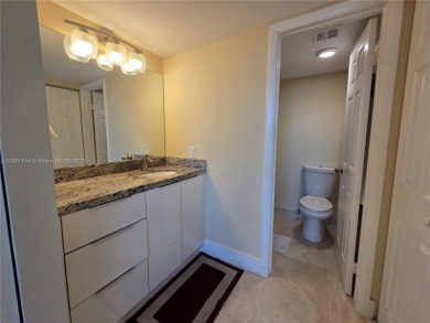 Welcome to this updated spacious condo located on the top floor on Pine Island Ridge Country Club in Florida - for sale on GolfHomes.com, golf home, golf lot