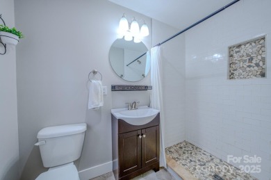 Charming and beautifully updated home nestled at the base of on Springdale Golf - Country Club in North Carolina - for sale on GolfHomes.com, golf home, golf lot