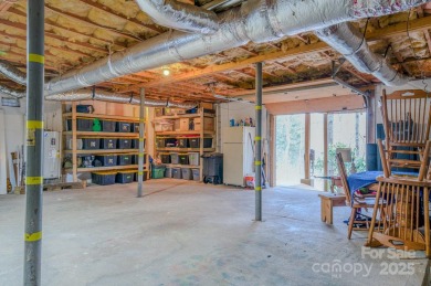 Charming and beautifully updated home nestled at the base of on Springdale Golf - Country Club in North Carolina - for sale on GolfHomes.com, golf home, golf lot