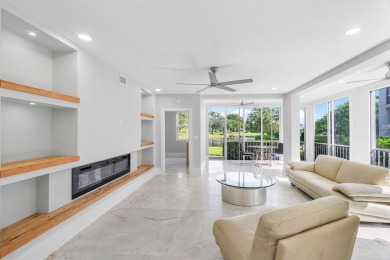 Experience luxury living in this fully renovated first-floor on Polo Club of Boca Raton in Florida - for sale on GolfHomes.com, golf home, golf lot