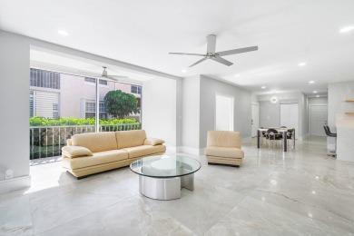 Experience luxury living in this fully renovated first-floor on Polo Club of Boca Raton in Florida - for sale on GolfHomes.com, golf home, golf lot