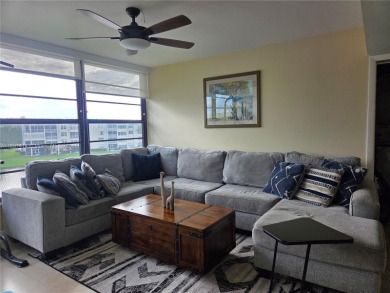 Welcome to this updated spacious condo located on the top floor on Pine Island Ridge Country Club in Florida - for sale on GolfHomes.com, golf home, golf lot