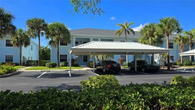 FIRST FLOOR, LAKE VIEW, END UNIT 2/2 PLUS French doors DEN condo on Deep Creek Golf Club in Florida - for sale on GolfHomes.com, golf home, golf lot