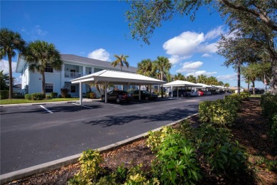 FIRST FLOOR, LAKE VIEW, END UNIT 2/2 PLUS French doors DEN condo on Deep Creek Golf Club in Florida - for sale on GolfHomes.com, golf home, golf lot