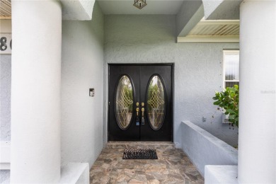 Welcome to this BEAUTIFUL 3-bedroom, 2-bathroom, 2-car garage on Deep Creek Golf Club in Florida - for sale on GolfHomes.com, golf home, golf lot