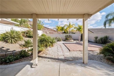 This beautiful single story home is in gate guarded 55+ on Menifee Lakes Country Club - Lakes in California - for sale on GolfHomes.com, golf home, golf lot