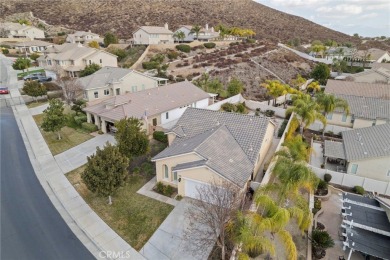 This beautiful single story home is in gate guarded 55+ on Menifee Lakes Country Club - Lakes in California - for sale on GolfHomes.com, golf home, golf lot