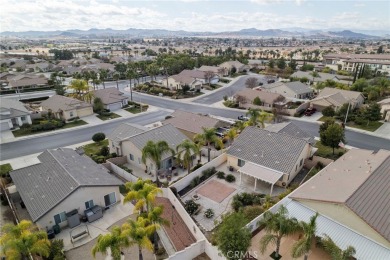 This beautiful single story home is in gate guarded 55+ on Menifee Lakes Country Club - Lakes in California - for sale on GolfHomes.com, golf home, golf lot