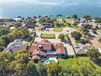 CALLING ALL INVESTORS! This Large 5-bedroom, 7-bath estate with on De Cordova Bend Country Club in Texas - for sale on GolfHomes.com, golf home, golf lot