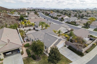 This beautiful single story home is in gate guarded 55+ on Menifee Lakes Country Club - Lakes in California - for sale on GolfHomes.com, golf home, golf lot