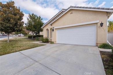 This beautiful single story home is in gate guarded 55+ on Menifee Lakes Country Club - Lakes in California - for sale on GolfHomes.com, golf home, golf lot